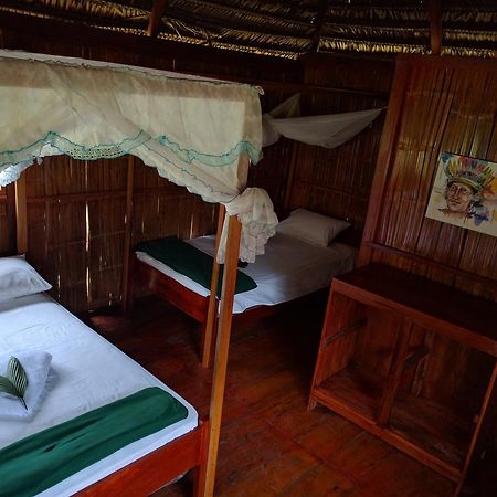 Green Forest Ecolodge Puerto Montufar Buitenkant foto